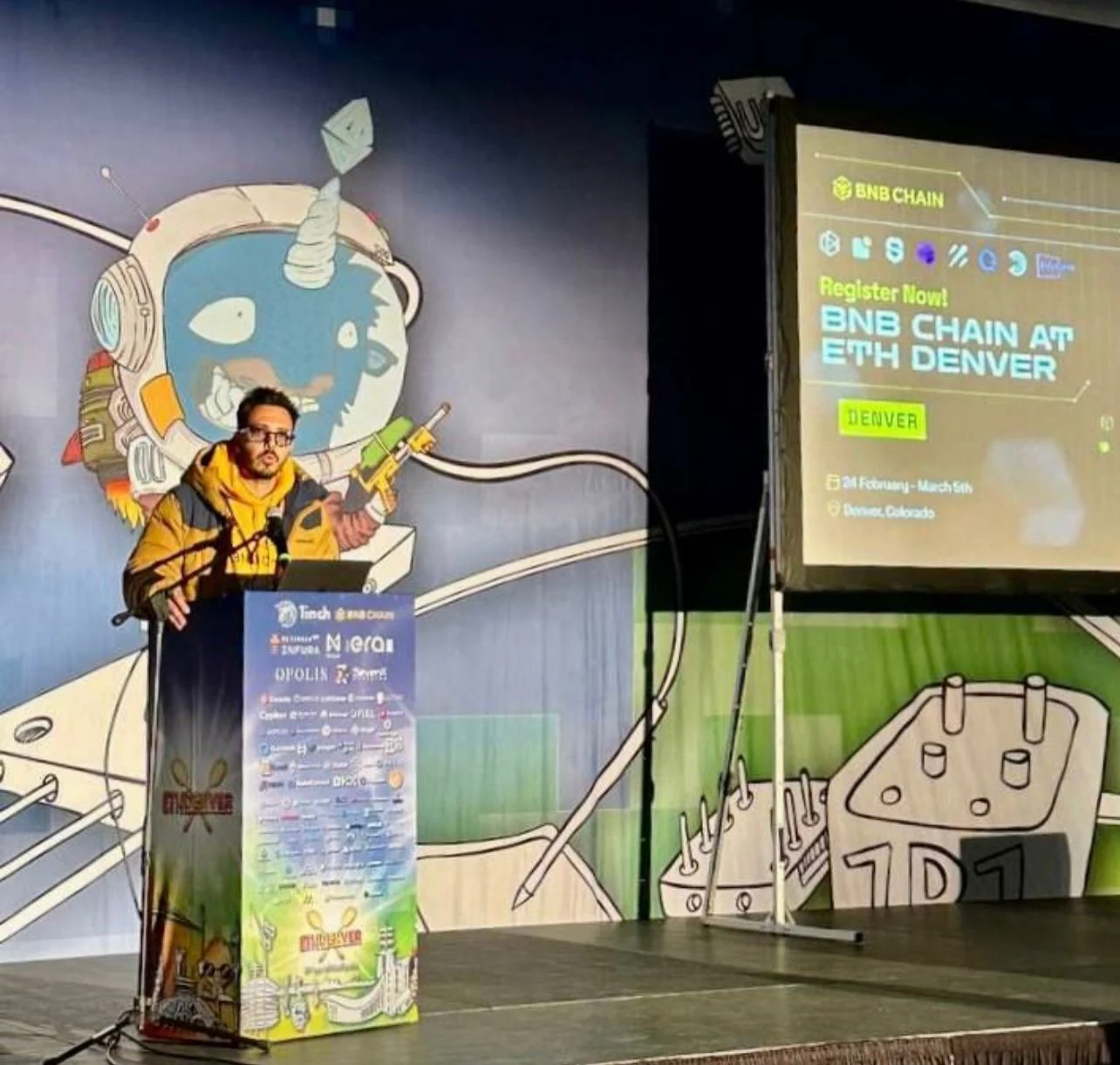 John Izaguirre speaking at the BNB Chain keynote at ETHDenver 2023.